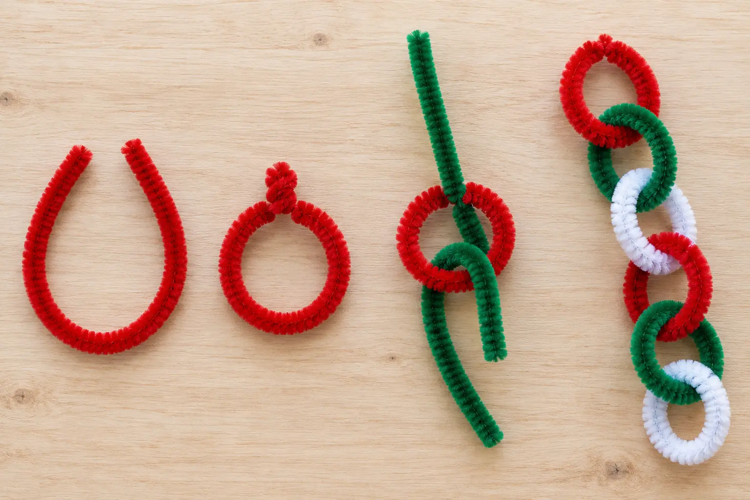 Four stages showing a pipe cleaner bent into a loop, twisted closed and linked into a red, green and white chain